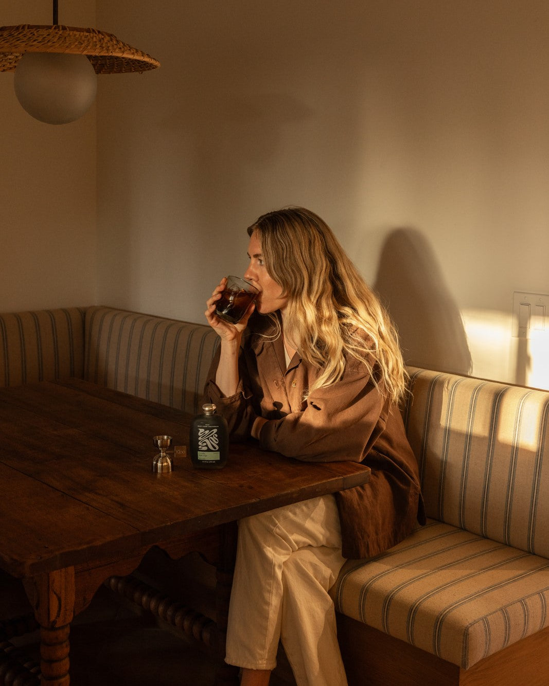 woman savoring kloo coffee